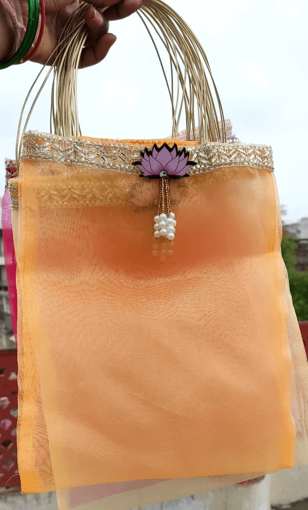 Tissue Lotus Organza Handbag (6) potli for gifting, potli bags for women, potli bags for ladies, potli bags for bride, potli bags for return gifts, potli bags for gift, potli bags for gifting, potli bags for wedding, potli bags for wedding gift, potli bags for wedding guests, potli bags for wedding retun gifts, girls potli bags for wedding, potli bags for chocolates, potli bags for dry fruits, potli bags for packing, potli bags for packaging, potli bags for gift packing, wedding party favor gift bags, party favor bags, shagun potli pouch, shagun potli pouches, traditional potli bags, traditional bags for ladies, traditional pouches for ladies, potli pouches, potli pouch bags, pouches for dry fruit packing, pouches for packing, pouches for packaging, packaging pouch for candy, jewellery pouch for ladies, bridal potli purse, bridal potli bags, sangeet potli bags, potli bags for sangeet, ladies sangeet gift items, mehndi return gifts, mehndi gift bags, haldi potli bags, potli bags for haldi ceremony, haldi ceremony return gifts, wedding party favors, mehndi party favors, return gifts for women, return gifts for haldi ceremony, diwali gift, diwali return gift, birthday gift, birthday return gift, return gifts, wedding gift, wedding return gift, baby shower gift, baby shower return gift, occasional gift, housewarming gifts, housewarming return gifts,
