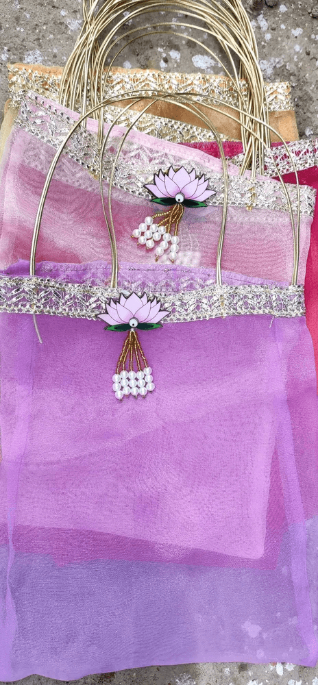 Tissue Lotus Organza Handbag (8) potli for gifting, potli bags for women, potli bags for ladies, potli bags for bride, potli bags for return gifts, potli bags for gift, potli bags for gifting, potli bags for wedding, potli bags for wedding gift, potli bags for wedding guests, potli bags for wedding retun gifts, girls potli bags for wedding, potli bags for chocolates, potli bags for dry fruits, potli bags for packing, potli bags for packaging, potli bags for gift packing, wedding party favor gift bags, party favor bags, shagun potli pouch, shagun potli pouches, traditional potli bags, traditional bags for ladies, traditional pouches for ladies, potli pouches, potli pouch bags, pouches for dry fruit packing, pouches for packing, pouches for packaging, packaging pouch for candy, jewellery pouch for ladies, bridal potli purse, bridal potli bags, sangeet potli bags, potli bags for sangeet, ladies sangeet gift items, mehndi return gifts, mehndi gift bags, haldi potli bags, potli bags for haldi ceremony, haldi ceremony return gifts, wedding party favors, mehndi party favors, return gifts for women, return gifts for haldi ceremony, diwali gift, diwali return gift, birthday gift, birthday return gift, return gifts, wedding gift, wedding return gift, baby shower gift, baby shower return gift, occasional gift, housewarming gifts, housewarming return gifts,